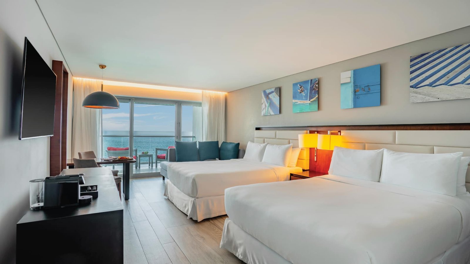 Habitación Ocean Front con dos camas queen en Hilton Vallarta Riviera